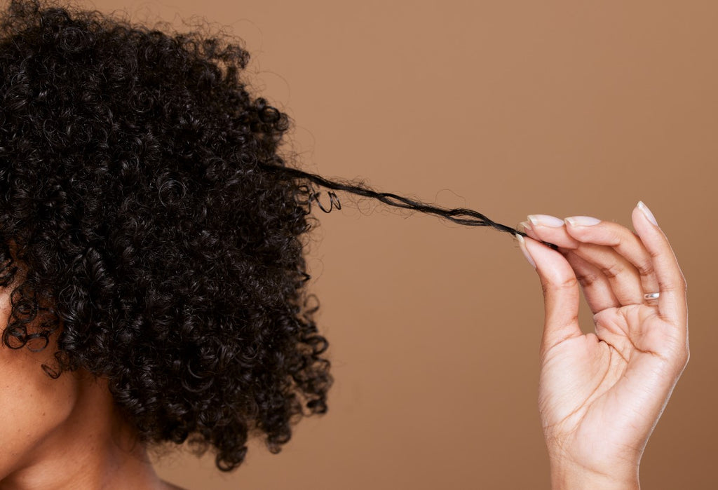 How to Give Your Hair Defense Against Frizz